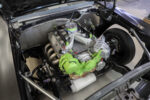 016 1969 Chevy Camaro engine bay with custom intake manifold and headers partially assembled
