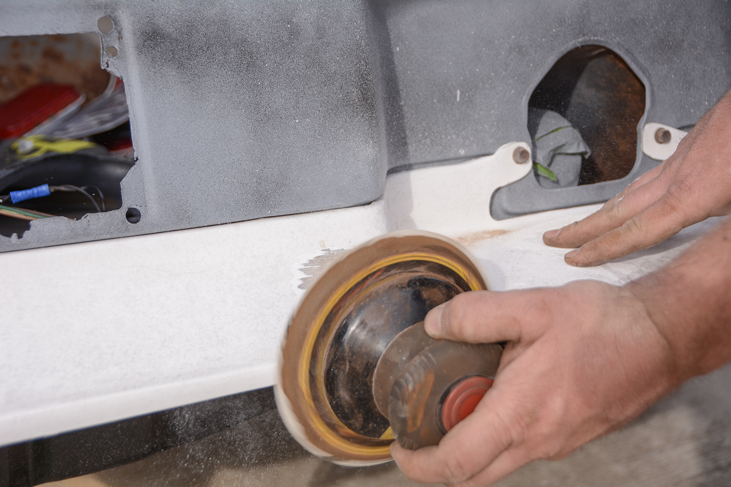016 larger sanding disc smooths the repaired area refining the surface for further finishing
