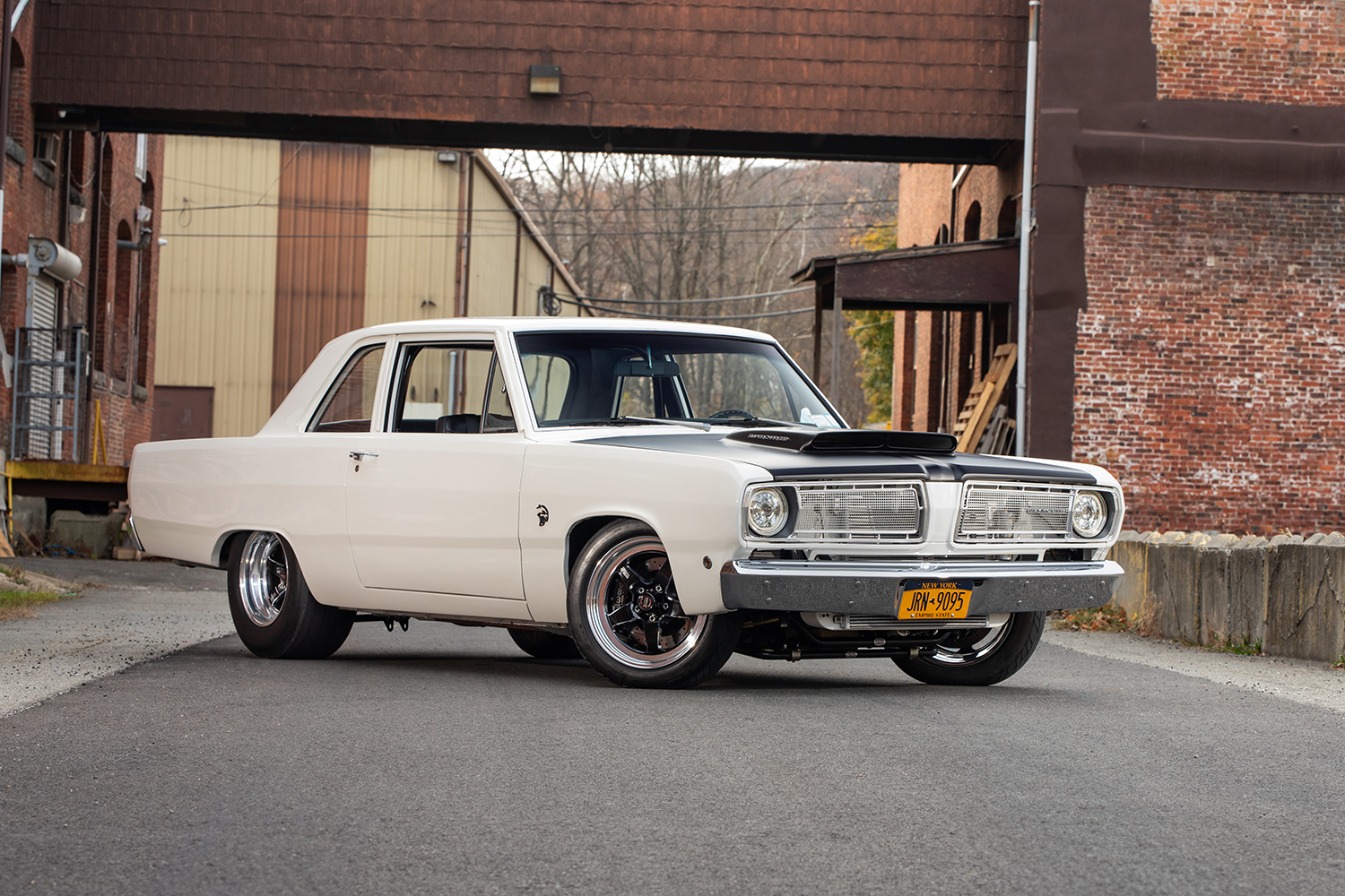 03 1968 Plymouth Valiant clean stance industrial building background