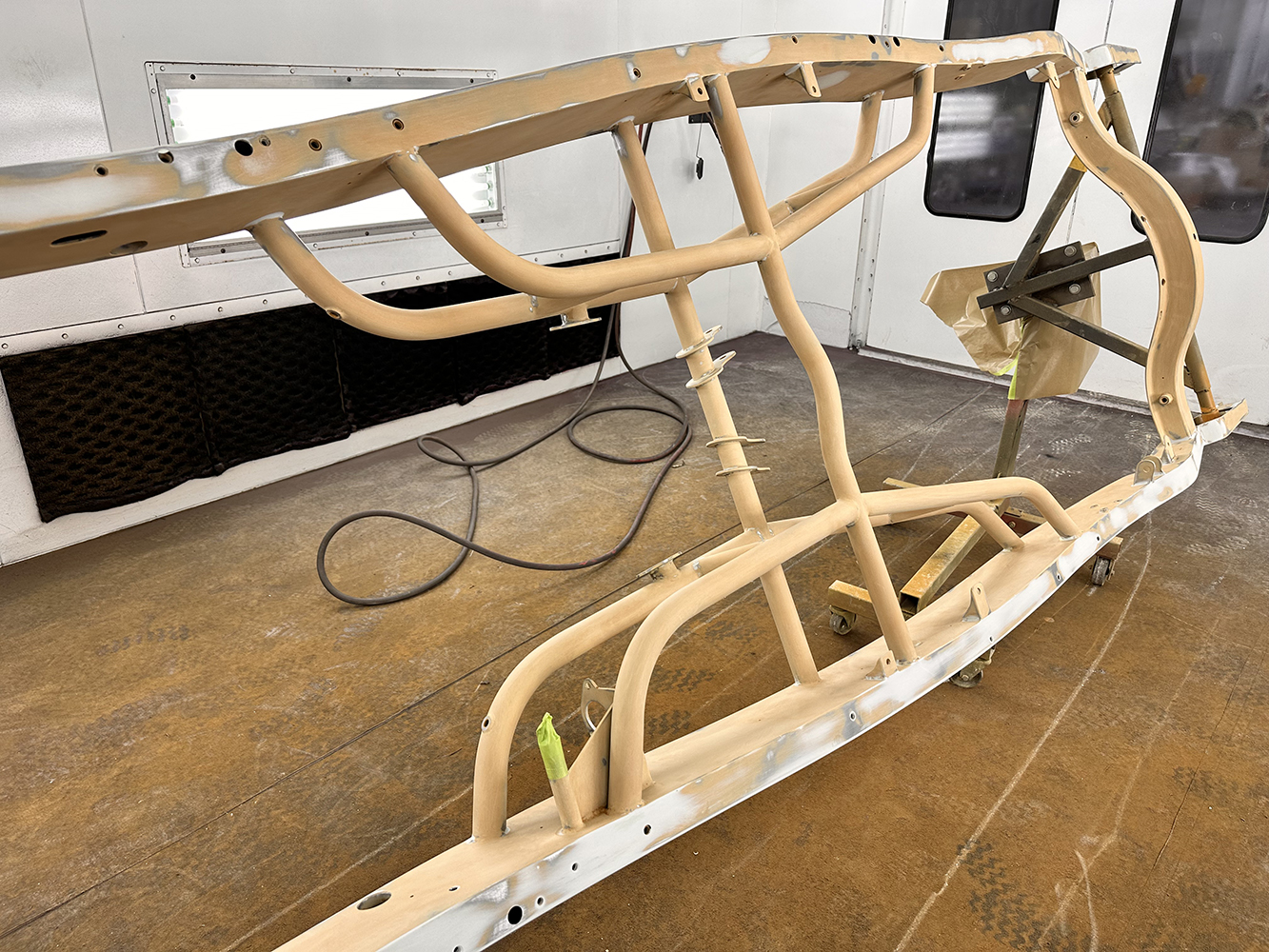 03 Tubular roadster chassis in primer showcasing its intricate structure for durability and performance