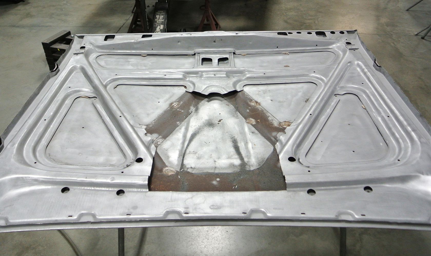 04 Modified hood structure with a clean cutout for improved engine clearance and airflow