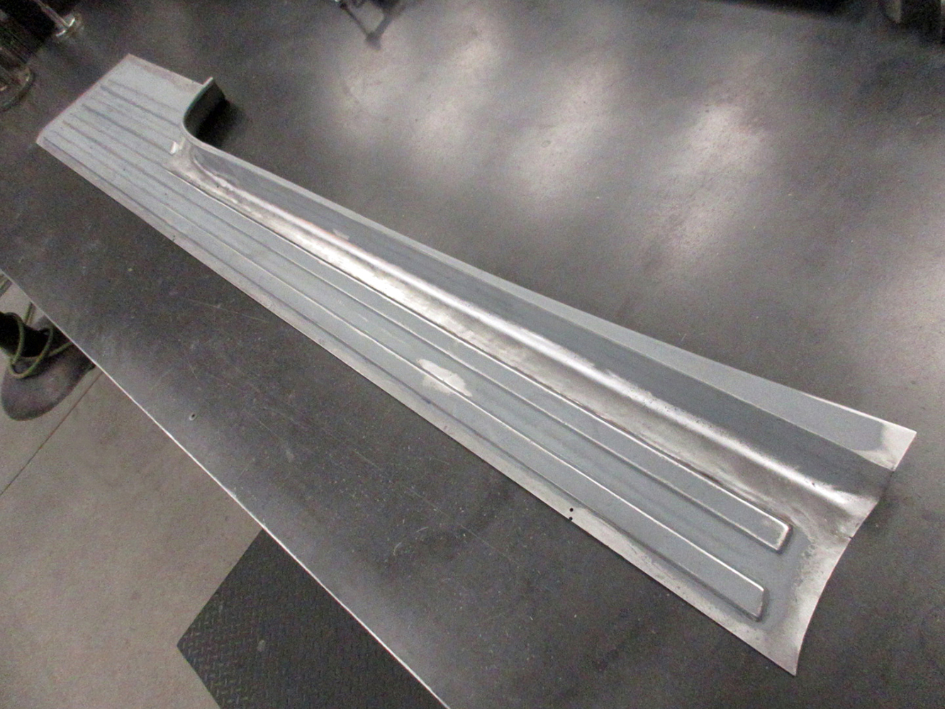 09 Ford F100 finished running board metal repair