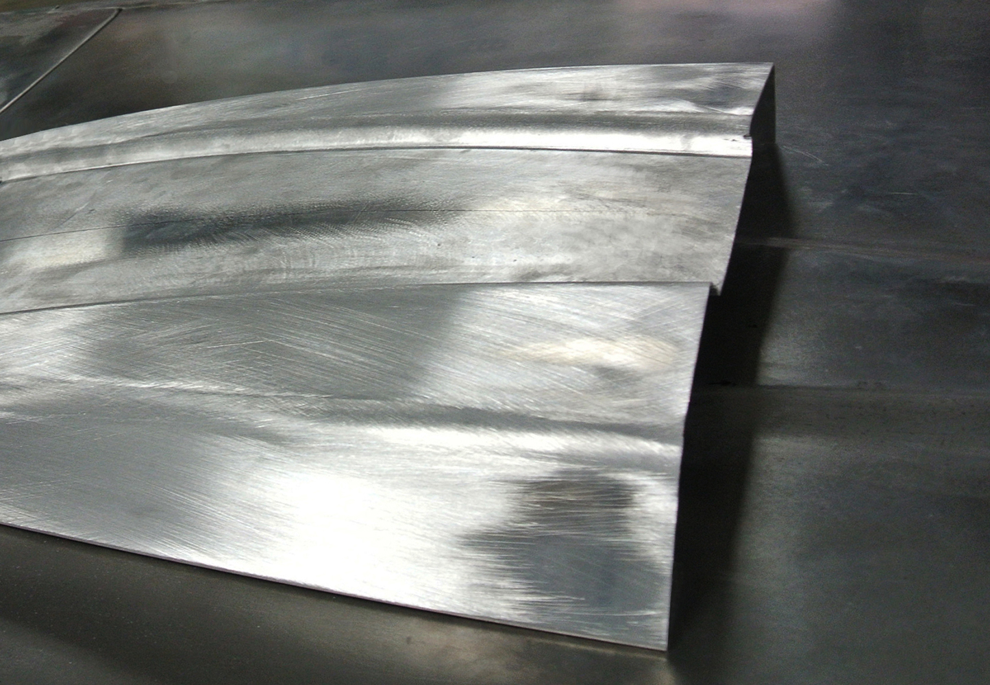 10 Handcrafted hood panels showing brushed aluminum texture for the 1971 Plymouth custom project
