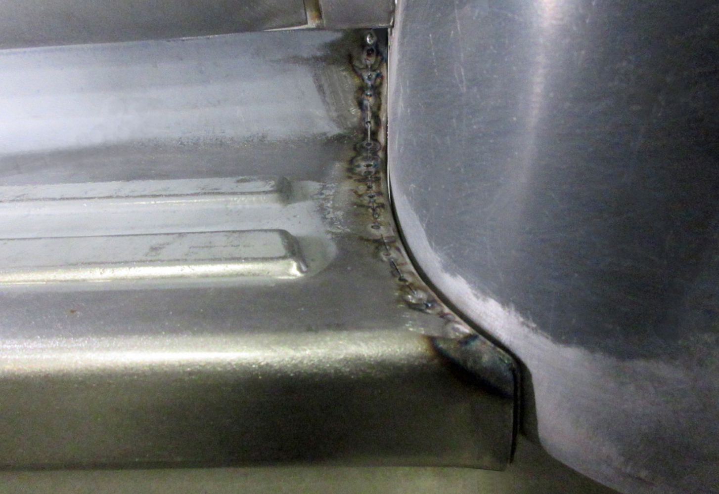 14 Ford F100 cab corner weld seam close up view