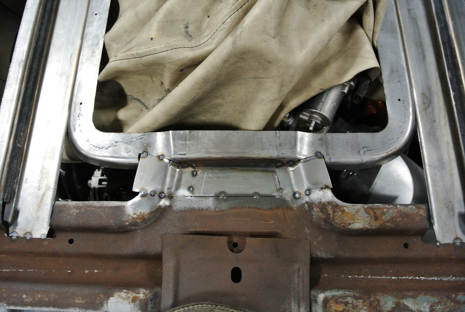 17 Custom weld work reinforcing the hood s lower framework with carefully aligned support pieces