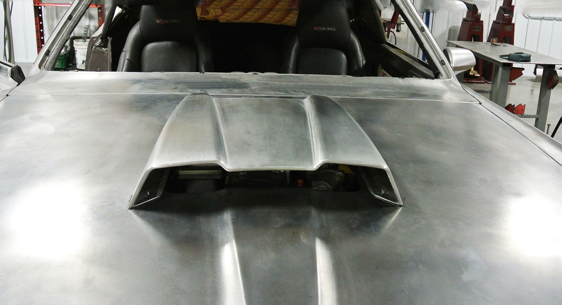 20 Final hood installation with an aggressive forward facing scoop integrated into a polished metal design