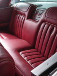 22 1958 Chevrolet Impala plush red leather rear seats custom stitching Impala logo on central rear panel