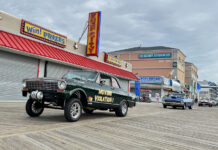 001 1966 Chevy Nova gasser Moving Violation on the boardwalk with high front lift and straight axle stance