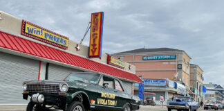 001 1966 Chevy Nova gasser Moving Violation on the boardwalk with high front lift and straight axle stance