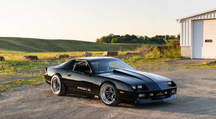 001 1986 Camaro IROC Z black pro touring stance with deep dish wheels aggressive street look