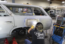 001 Fabricator welds a custom patch panel on the rear quarter of a 1966 Chevelle wagon at Old Anvil Speed Shop