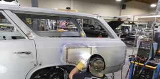 001 Fabricator welds a custom patch panel on the rear quarter of a 1966 Chevelle wagon at Old Anvil Speed Shop