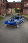 002 1966 Chevrolet Corvette blue front three quarter view Roger Penske Chevrolet livery race inspired design and side pipes