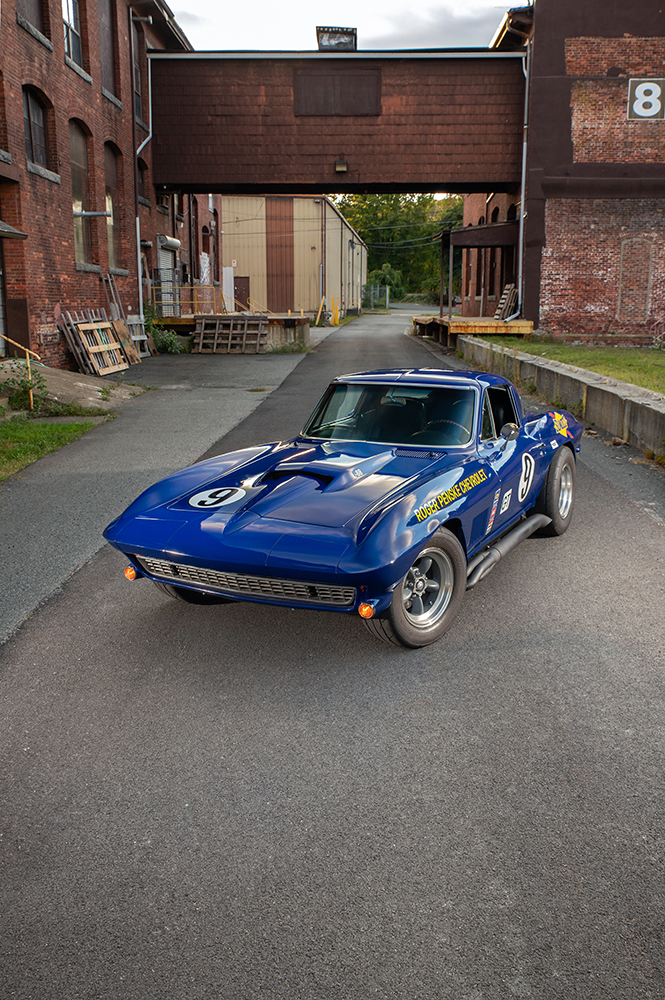 002 1966 Chevrolet Corvette blue front three quarter view Roger Penske Chevrolet livery race inspired design and side pipes