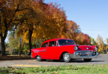 002 Side view of the 1957 Chevy showcasing its sleek body lines and polished wheels