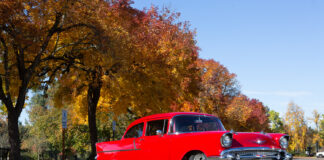002 Side view of the 1957 Chevy showcasing its sleek body lines and polished wheels