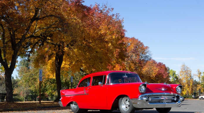 002 Side view of the 1957 Chevy showcasing its sleek body lines and polished wheels