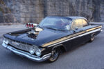 003 1961 Chevrolet Impala front grille with quad headlights chrome bumper and classic Chevrolet badging for a vintage muscle look