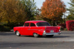 003 Rear angle of the Chevy Bel Air highlighting its signature tail fins and chrome trim