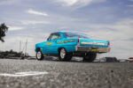 004 1966 Chevrolet Nova Gasser rear side view highlighting chrome bumpers bold graphics and 66QUAKE license plate