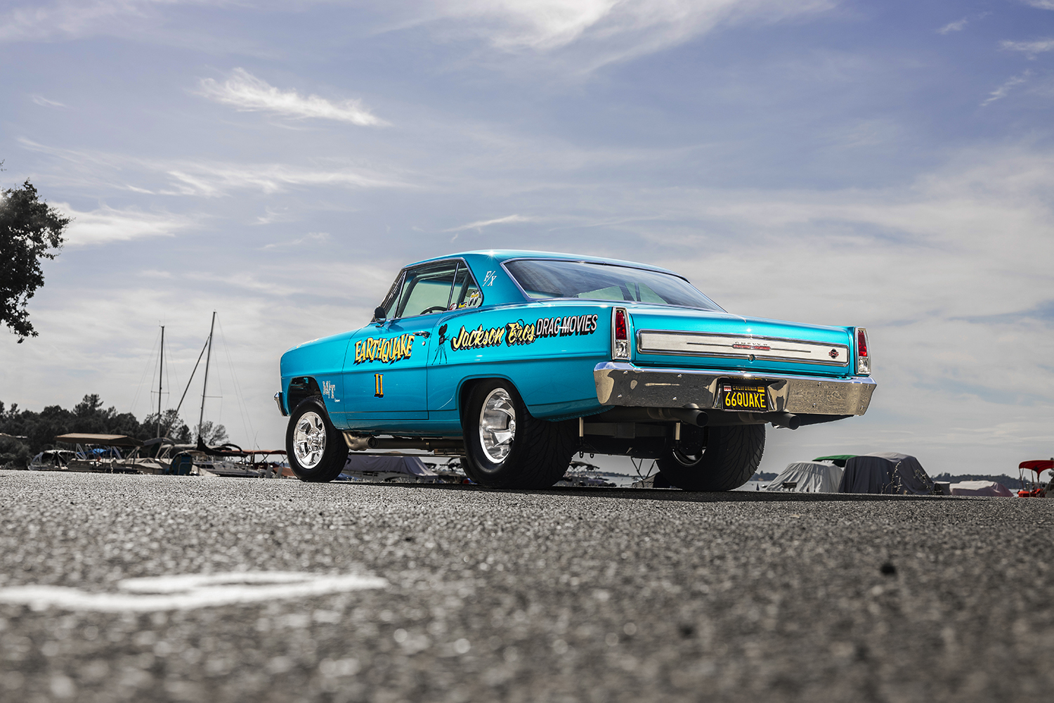 004 1966 Chevrolet Nova Gasser rear side view highlighting chrome bumpers bold graphics and 66QUAKE license plate