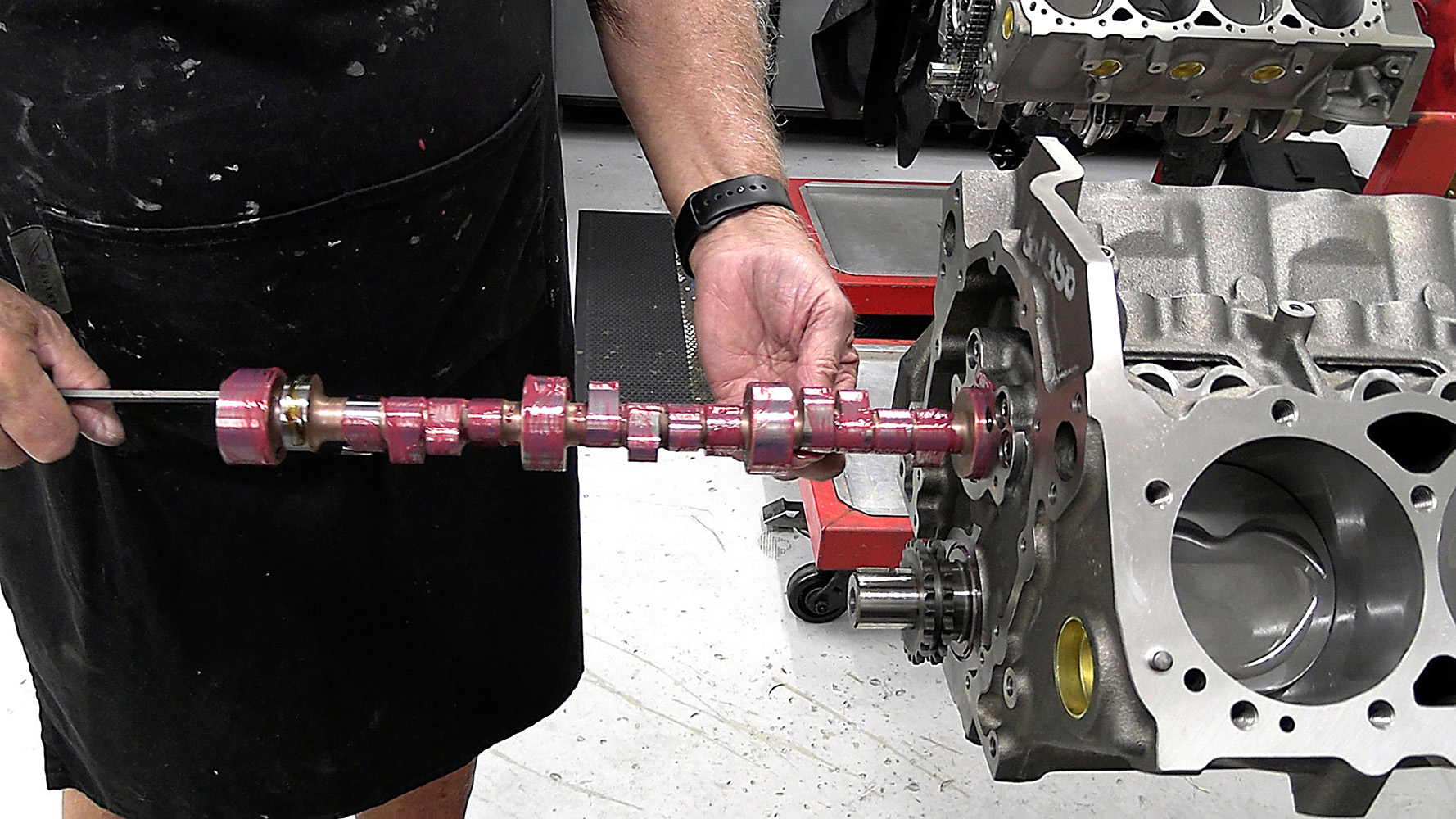 004 Technician installing a camshaft into the 424 small block engine with assembly lube applied