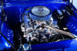 005 1969 Chevrolet Camaro engine bay featuring polished components blue accents and a high performance air intake
