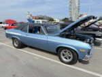 005 1970 Chevy Nova Yenko SC tribute in metallic blue with Cragar wheels and black vinyl roof