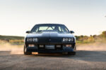 005 1986 Camaro IROC Z engine bay featuring AFR aluminum heads and Holley EFI system