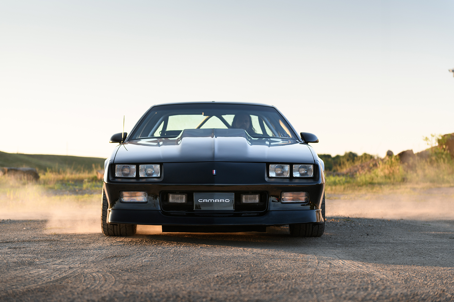 005 1986 Camaro IROC Z engine bay featuring AFR aluminum heads and Holley EFI system