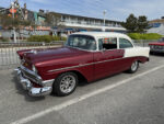 006 1956 Chevy Bel Air in two tone burgundy and white with polished aluminum wheels