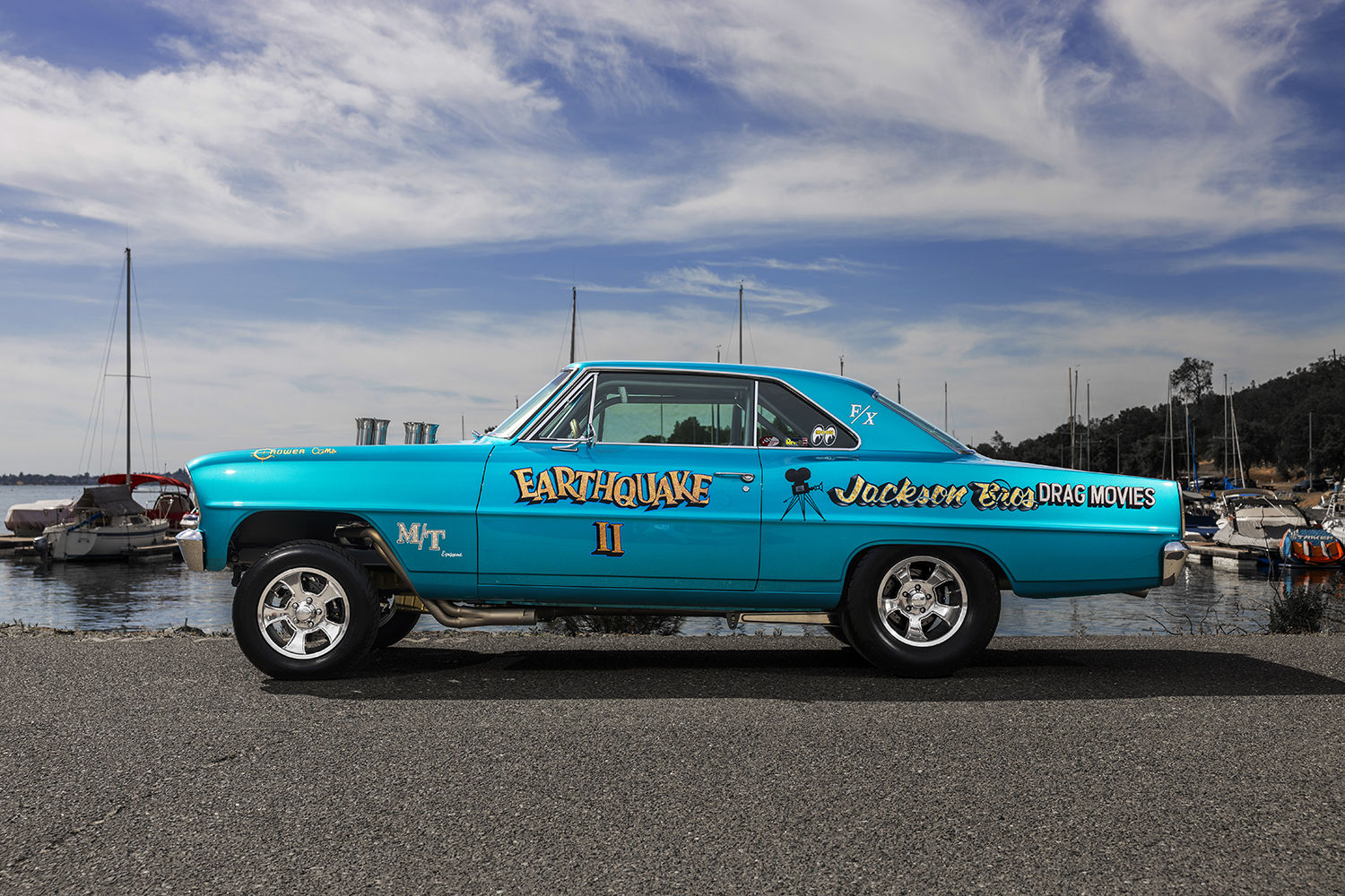 006 1966 Chevrolet Nova Gasser side profile showing its elevated front suspension and drag race detailing