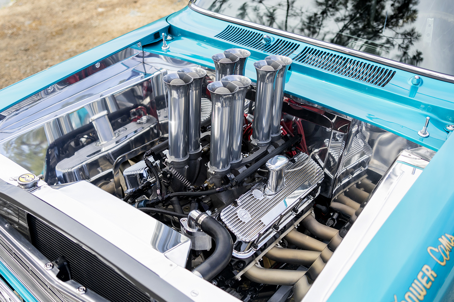 007 1966 Chevrolet Nova Gasser polished engine bay featuring tall intake stacks and chrome performance components