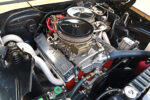 007 1967 Chevrolet Nova dual carbureted engine bay featuring Edelbrock intake manifold and Holley carburetors