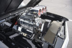 008 1961 Chevrolet Impala rear suspension with massive slick tires tucked under the fender for ultimate traction and stability