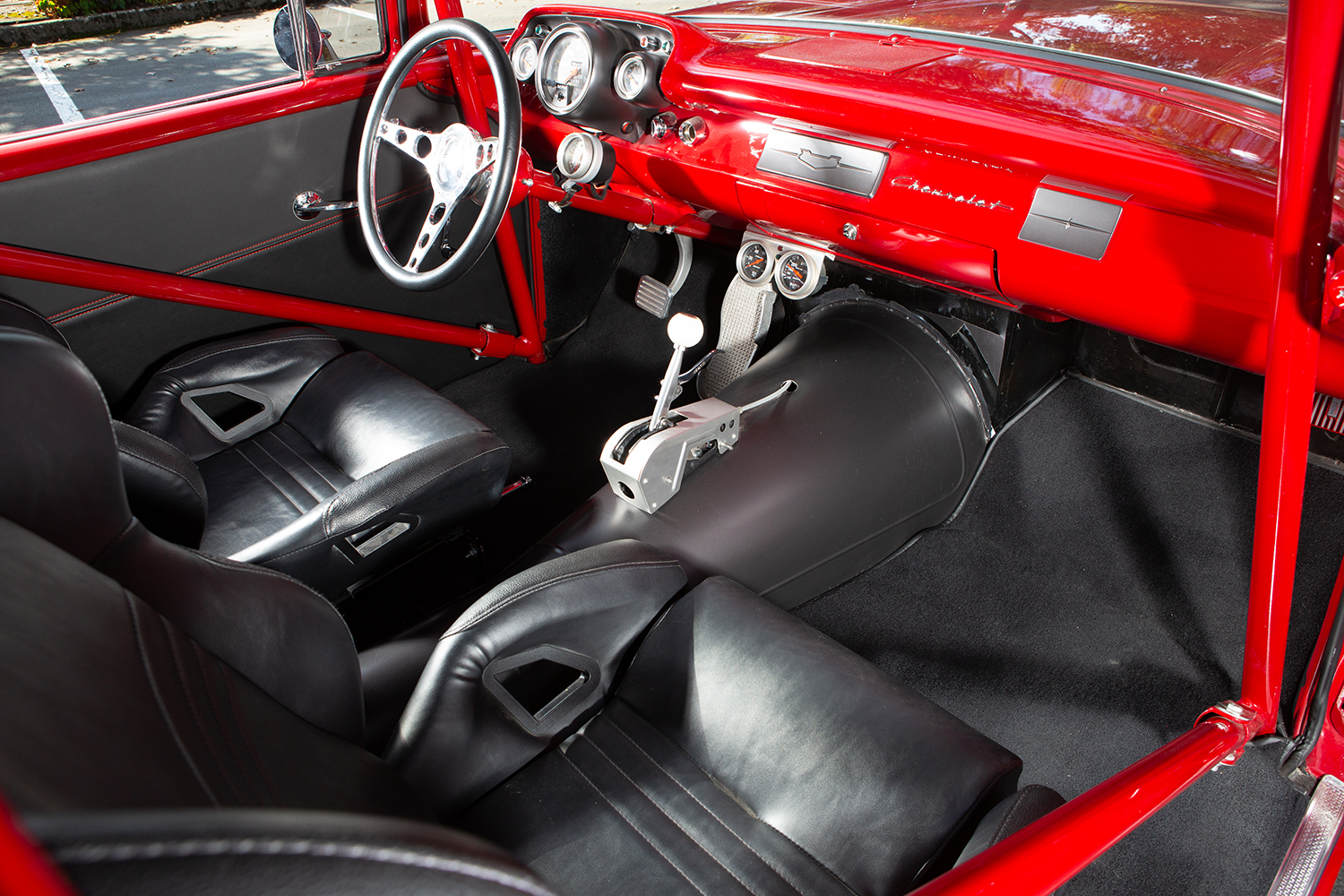 009 1957 Chevy Black leather interior with racing seats a roll cage and a B&M ratchet shifter