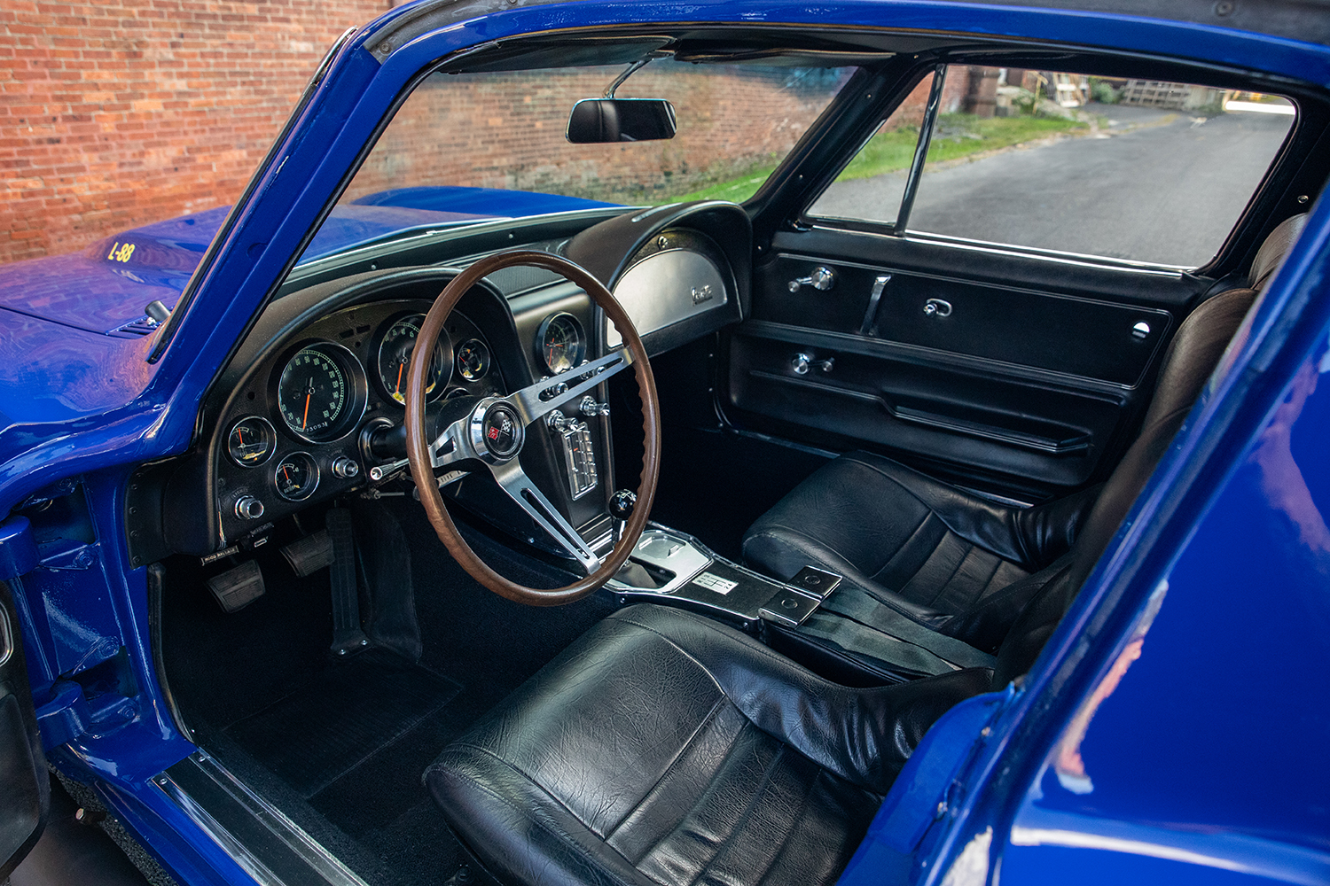 009 1966 Chevrolet Corvette black leather bucket seats classic cabin design and attention to racing inspired interior details