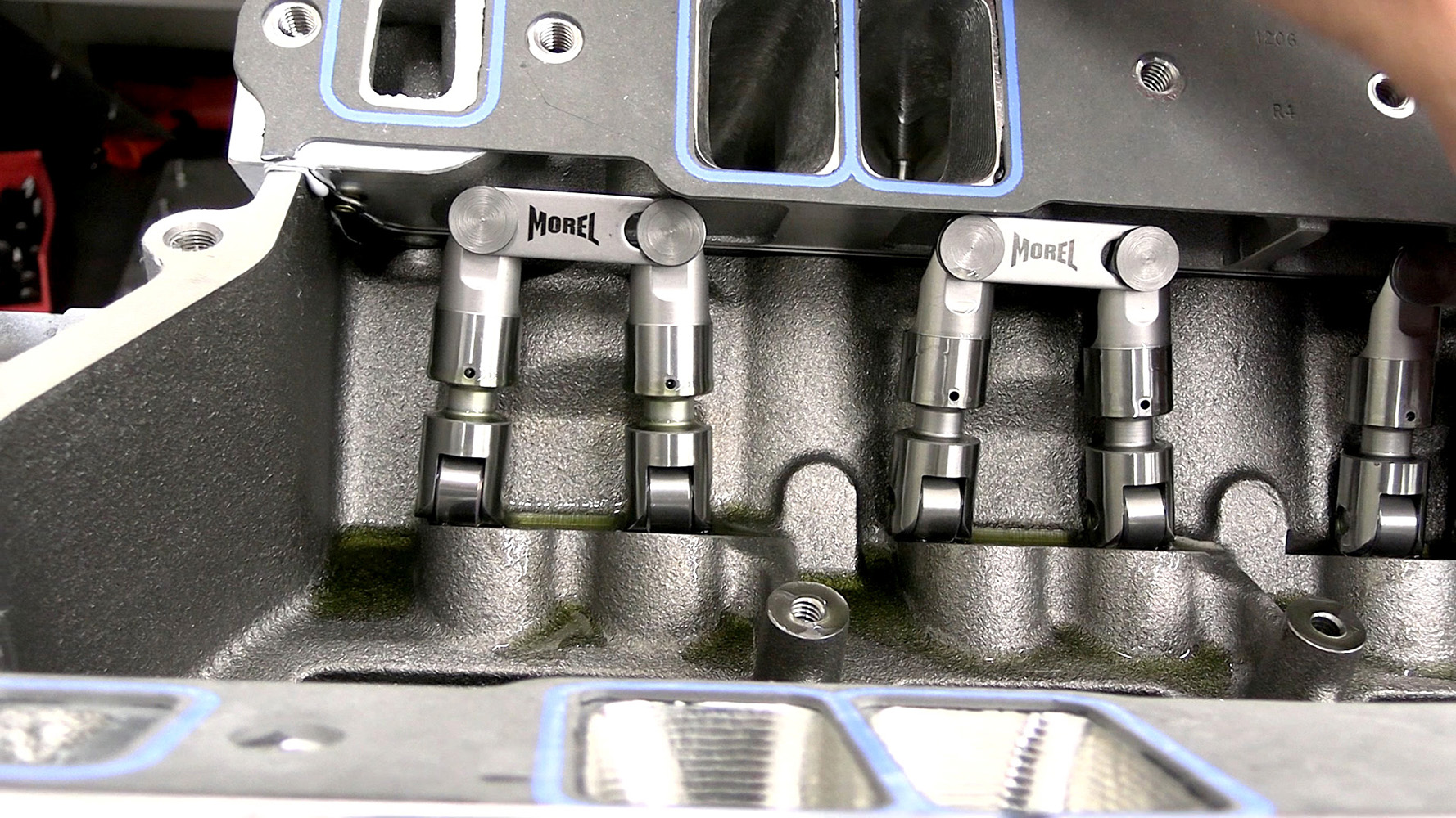 009 Morel roller lifters installed in the block showcasing precise alignment for durability