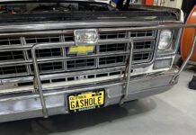 00A Power rack and pinion steering conversion kit in front of a 1980s Chevrolet truck