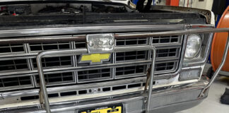 00A Power rack and pinion steering conversion kit in front of a 1980s Chevrolet truck