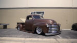 00A Slammed 1948 Chevy 3100 Matte brown paint wire wheels and a fully bagged stance