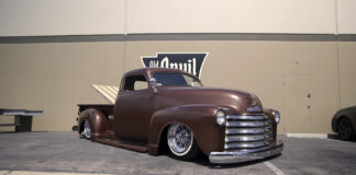 00A Slammed 1948 Chevy 3100 Matte brown paint wire wheels and a fully bagged stance