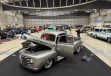 01 1949 Ford F1 – Silver with a modern stance polished wheels and a custom engine bay on display