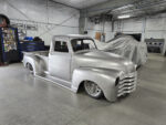01 Custom 1951 Chevy pickup with bare metal bodywork widened fenders and aggressive stance