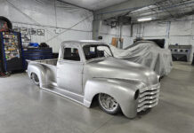 01 Custom 1951 Chevy pickup with bare metal bodywork widened fenders and aggressive stance