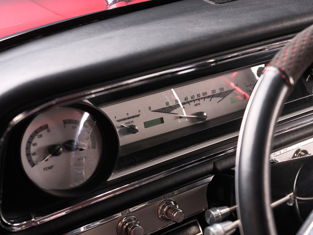 010 1965 Chevrolet Impala SS dashboard classic interior with modern gauges black finish and vintage speedometer