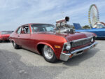010 1972 Chevy Nova drag car in red with massive blower intake and tubbed rear wheels