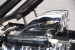 011 1961 Chevrolet Impala TBS supercharger with triple intake stacks feeding a high performance V8 for maximum horsepower