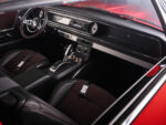 011 1965 Chevrolet Impala SS custom interior black leather seats with red stitching modern console and updated trim