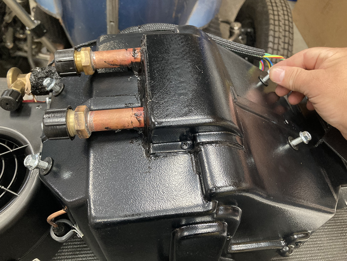 011 Mounting heater core connections on the Vintage Air AC unit